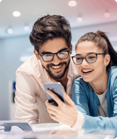 Man and woman using smartphone